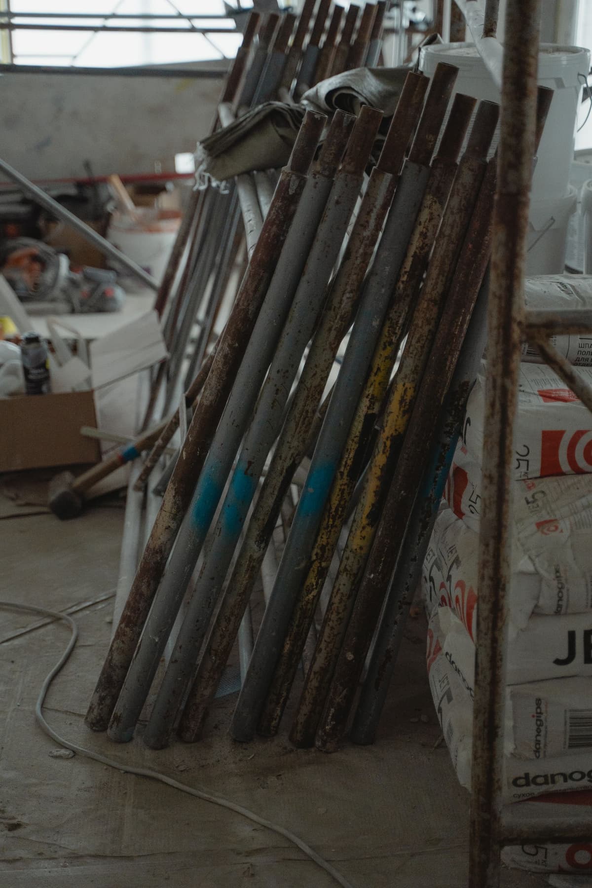 Professional handyman performing home repair work on a real job