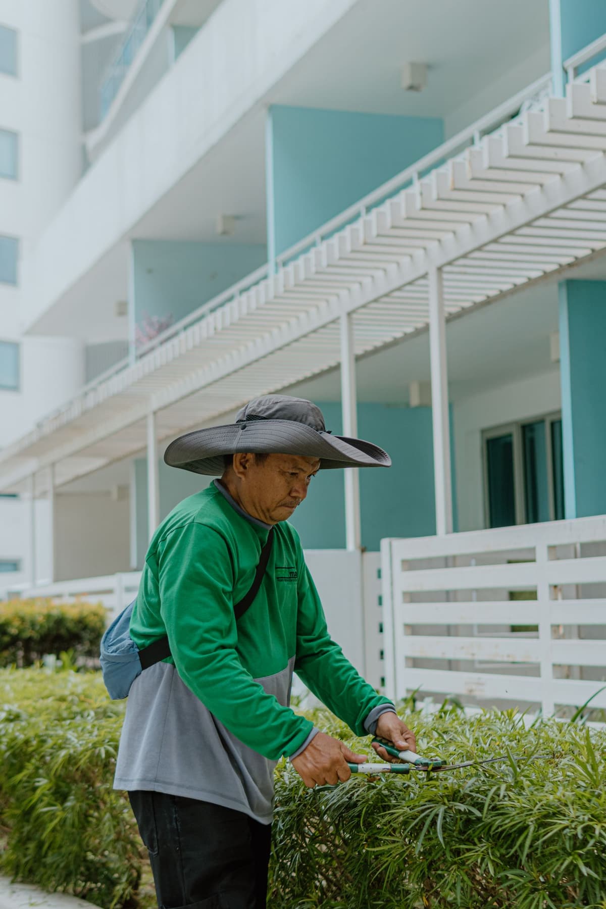 Professional landscaper performing landscaping work on a real job