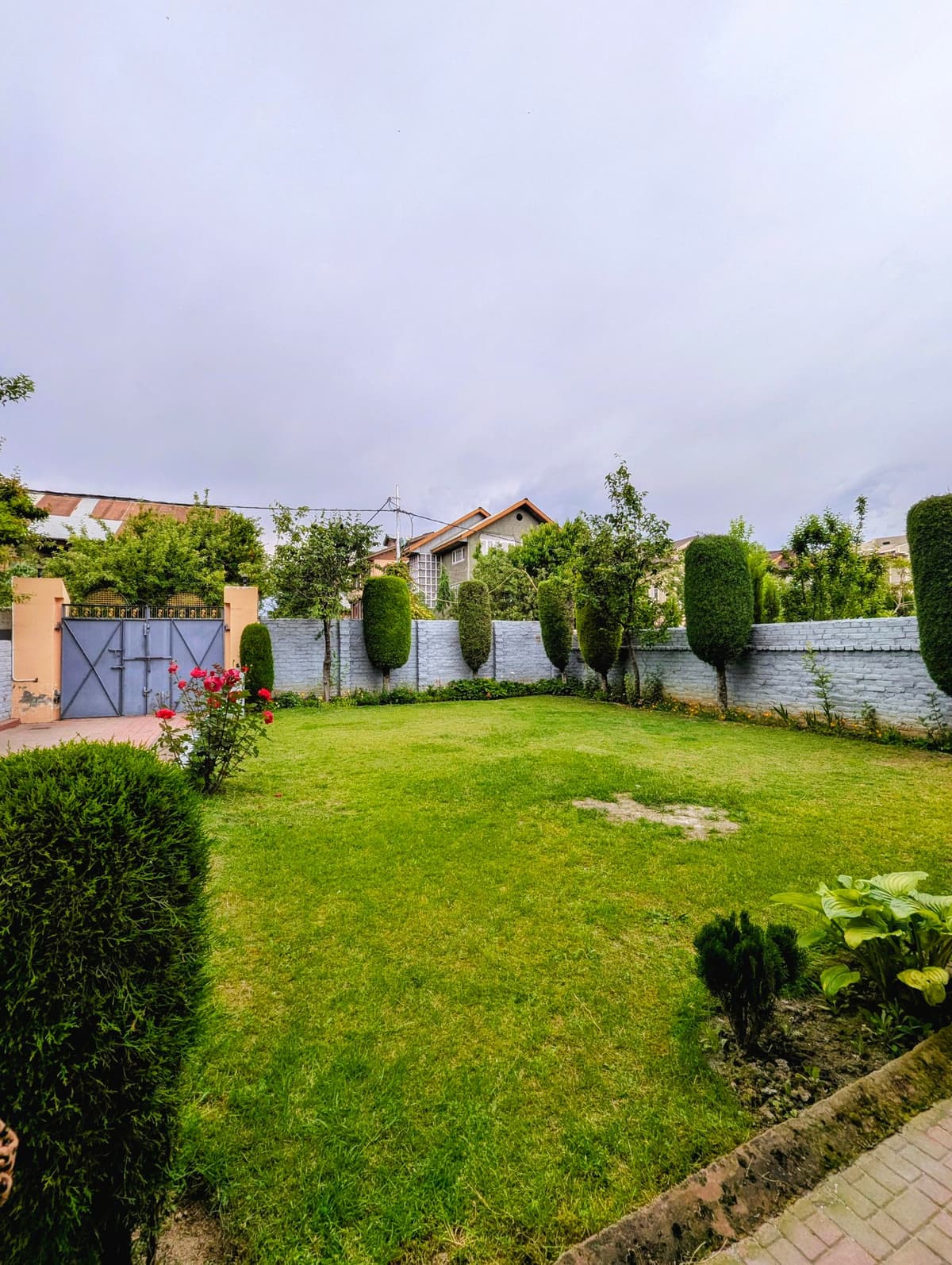 Professional landscaper performing landscaping work on a real job