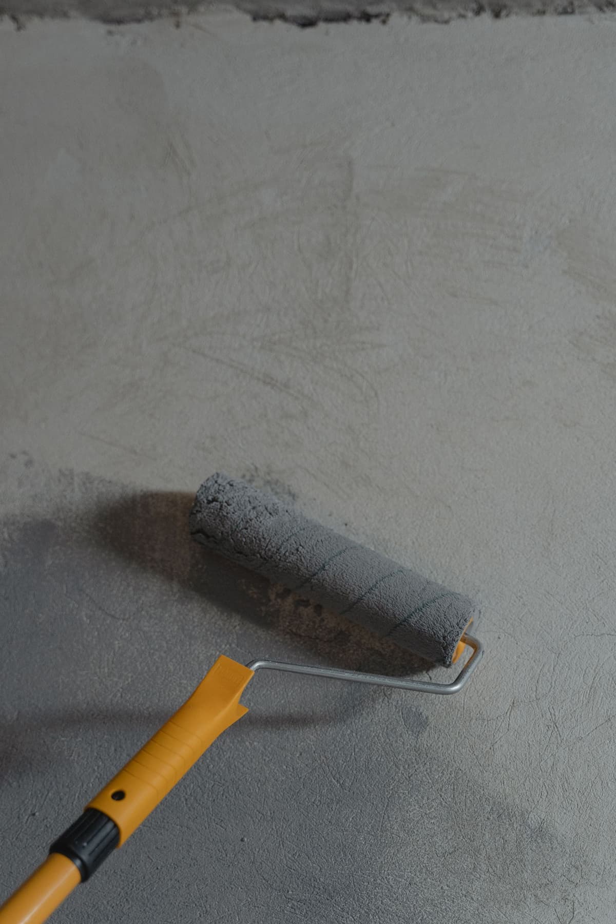 Professional painter performing painting work on a real job