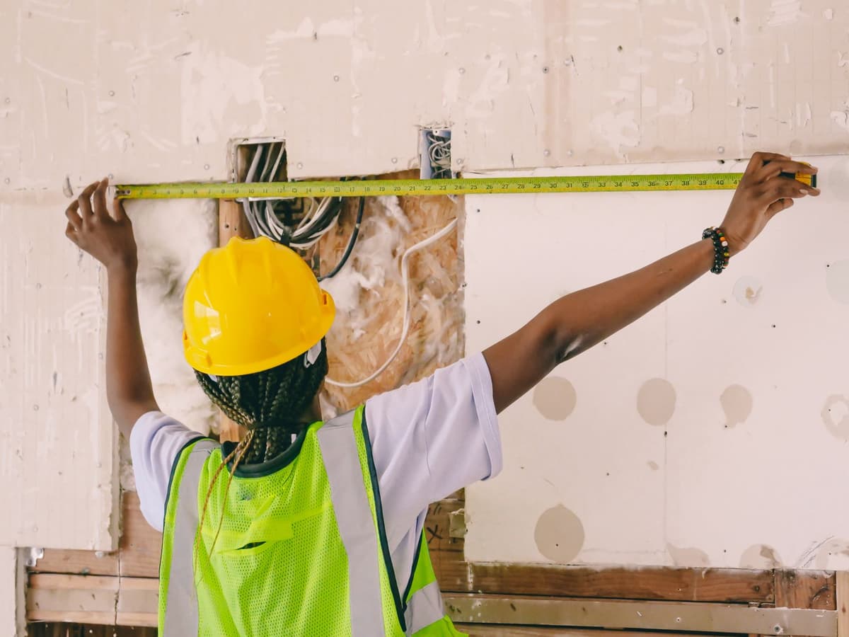 Professional plumber performing plumbing work on a real job