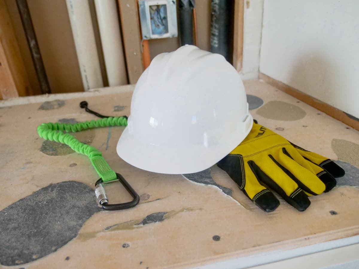 Professional plumber performing plumbing work on a real job