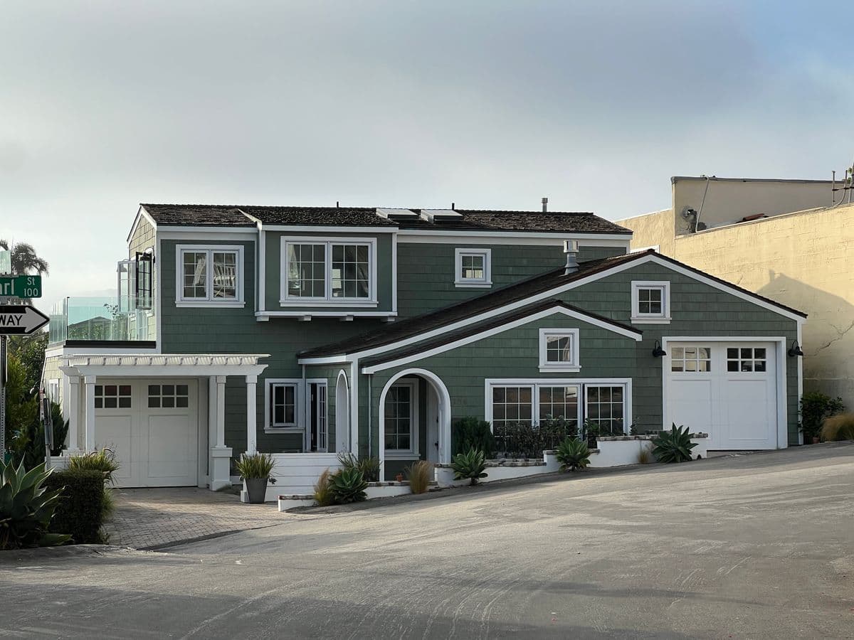 Suburban home with garage doors and driveway