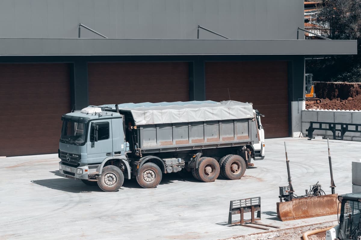 Professional dump truck ready for debris hauling and junk removal