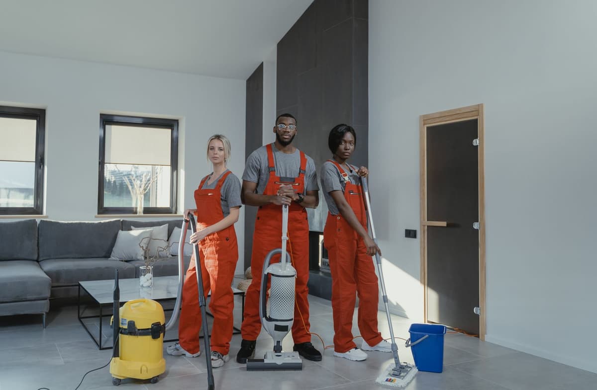 Professional cleaner performing cleaning services on a real job