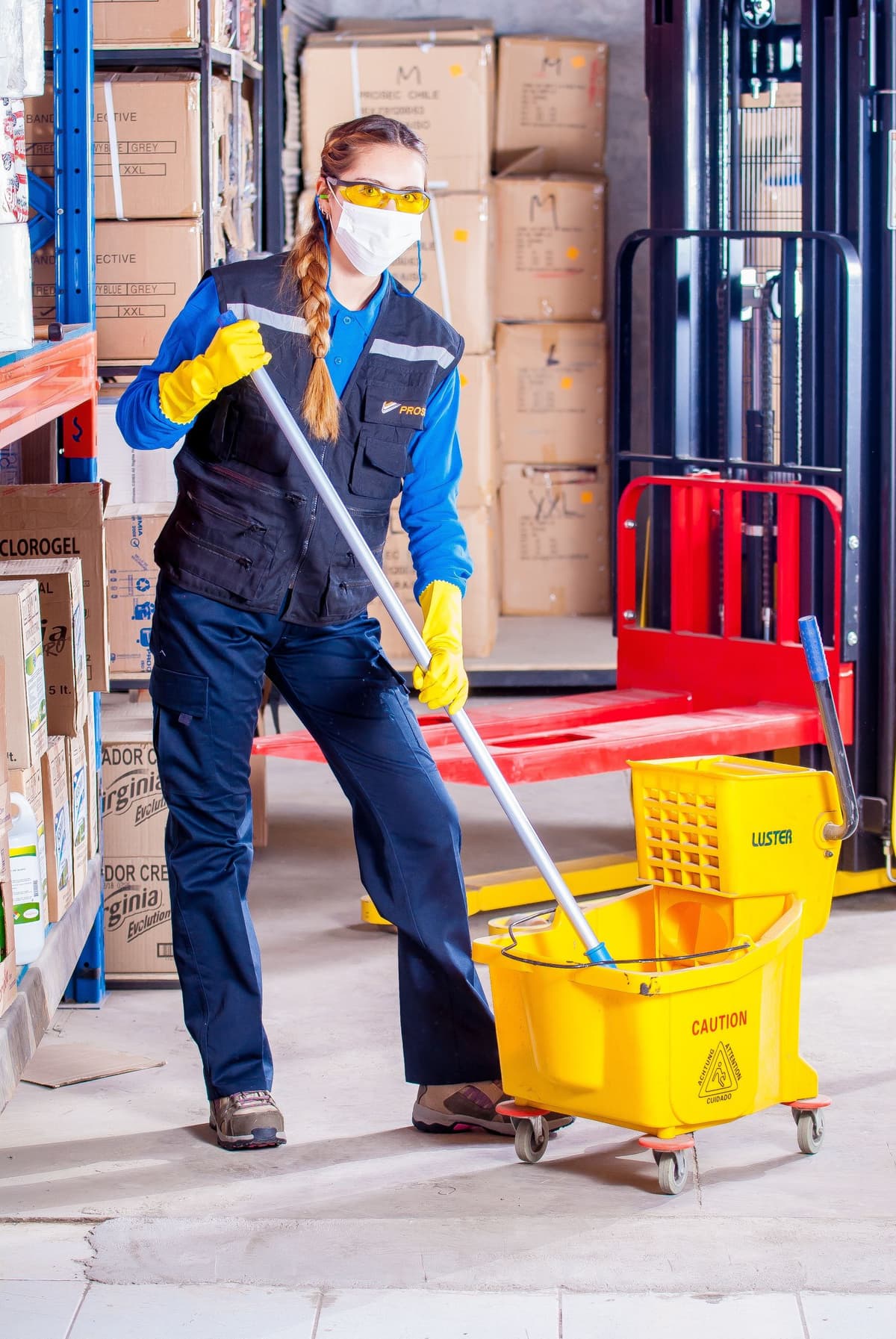 Professional cleaner performing cleaning services on a real job