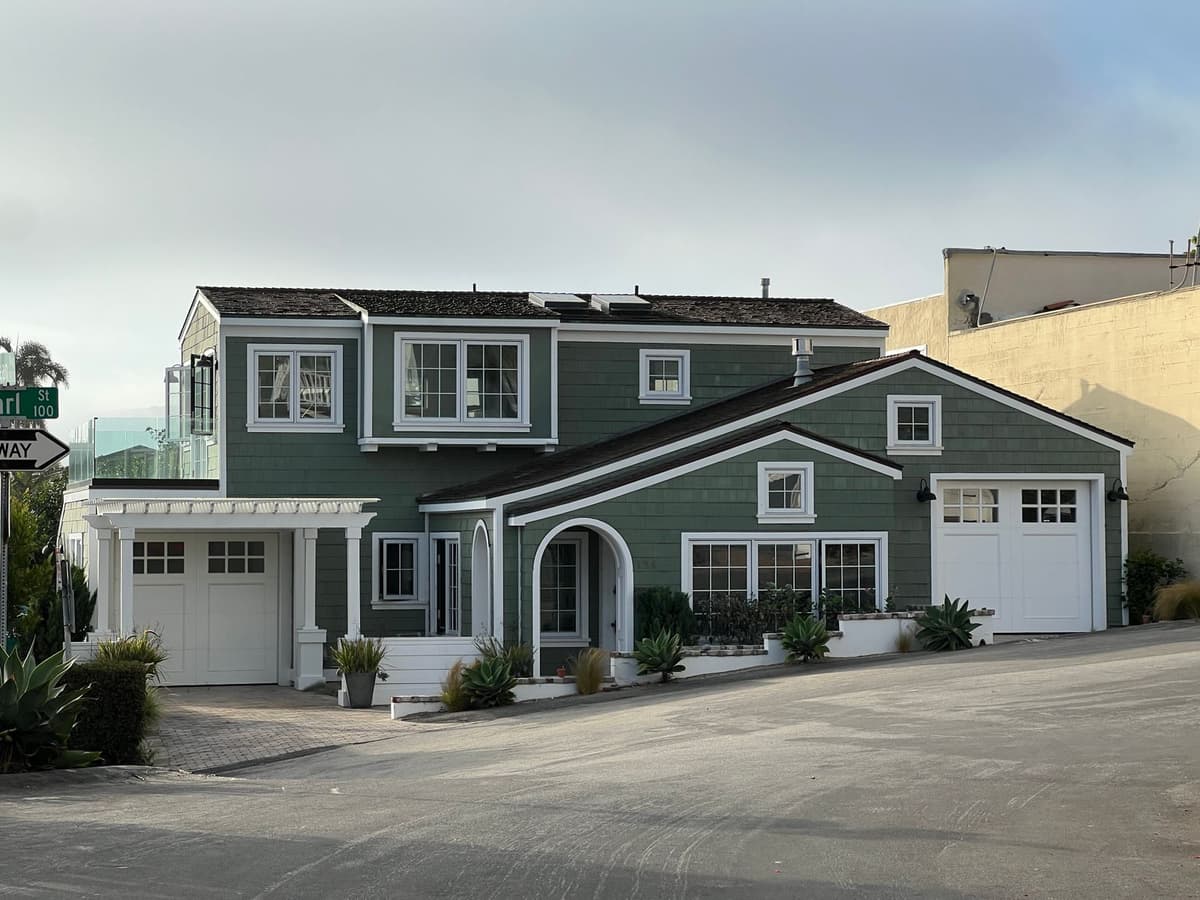 Professional garage door pro performing garage door service on a real job