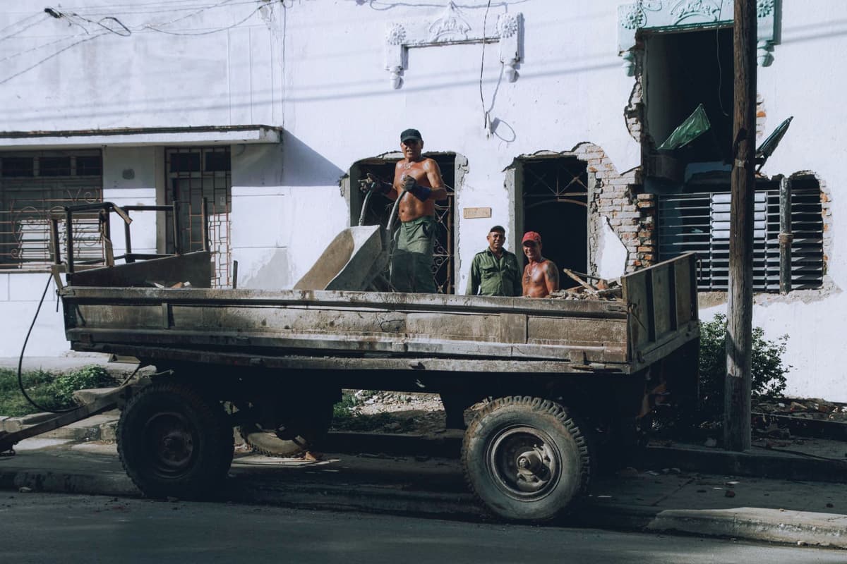 Professional junk removal crew performing junk hauling on a real job