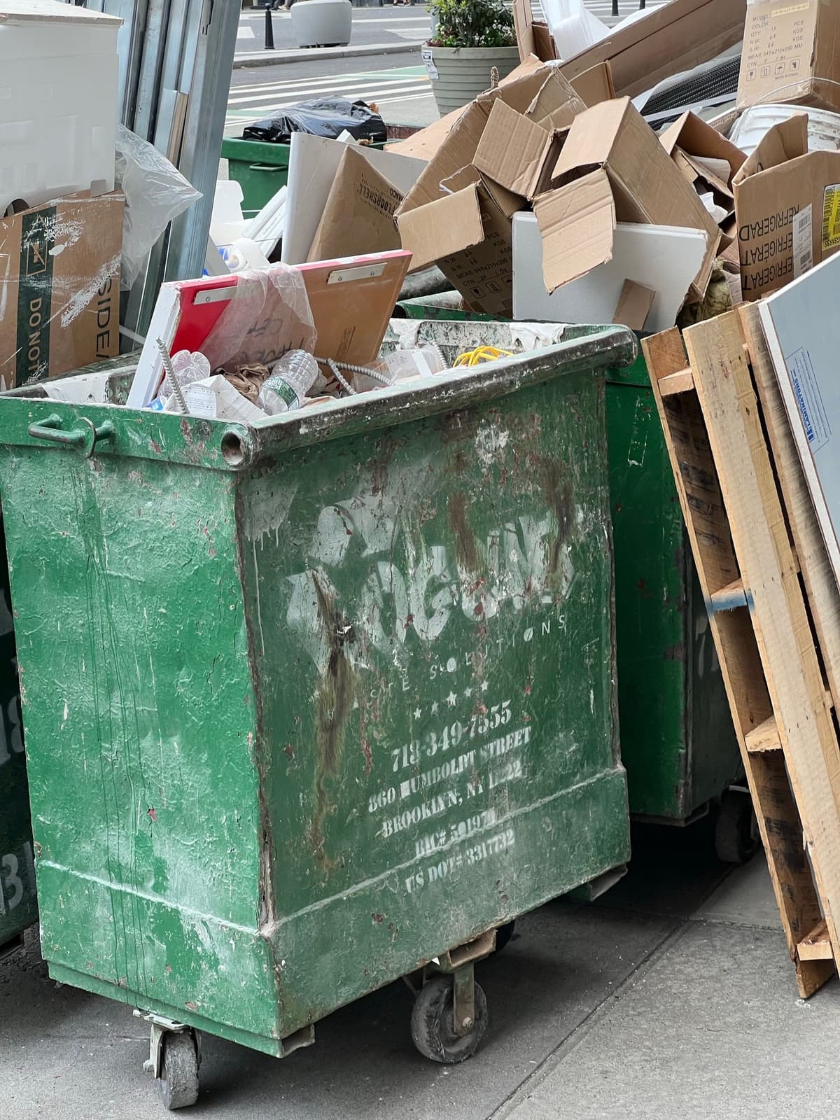 Professional junk removal crew performing junk hauling on a real job