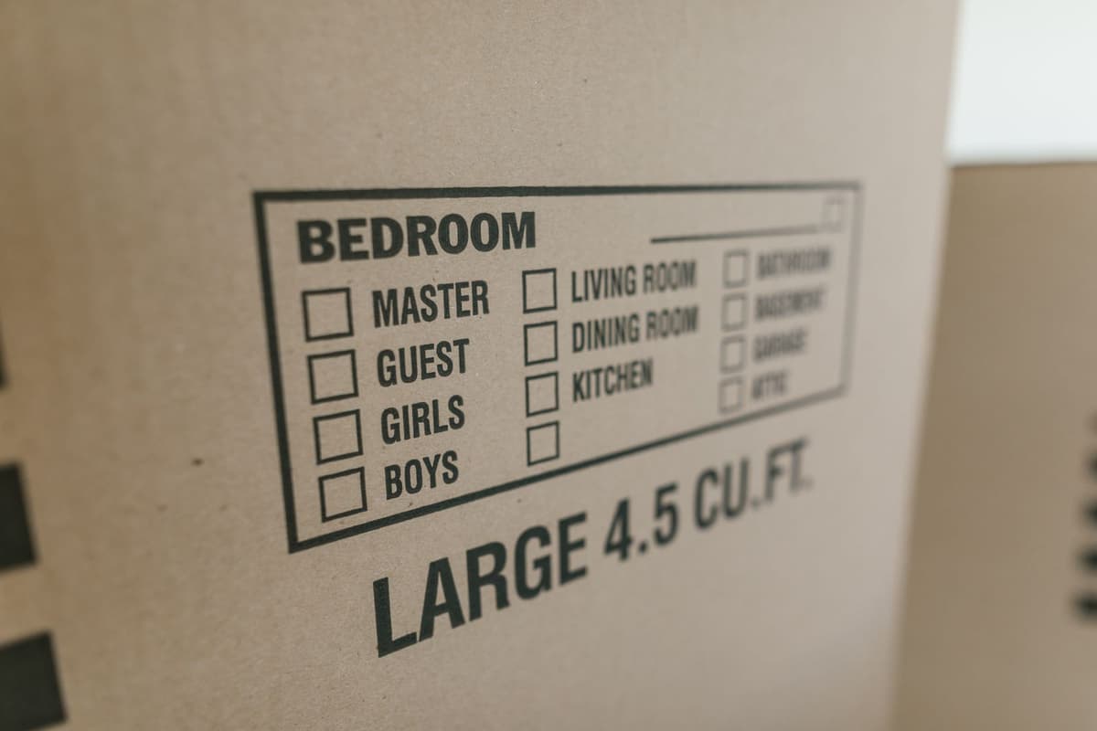 Professional mover performing moving services on a real job