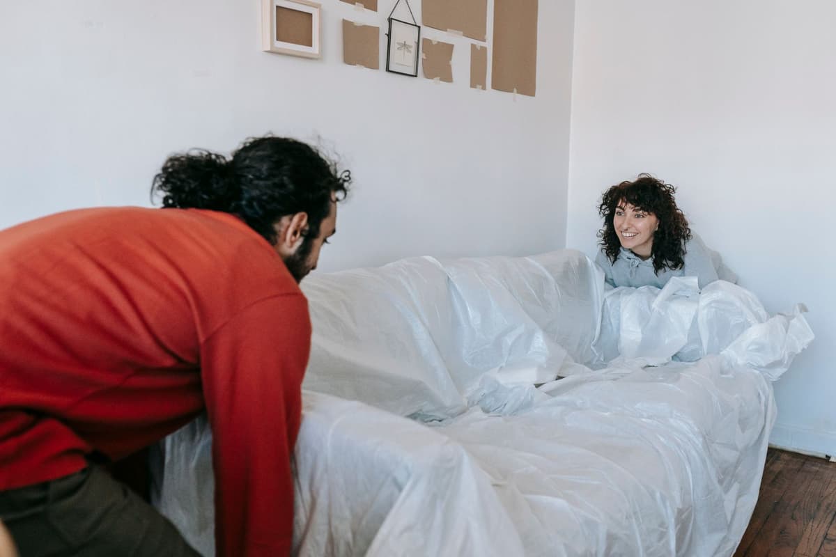 Professional mover performing moving services on a real job