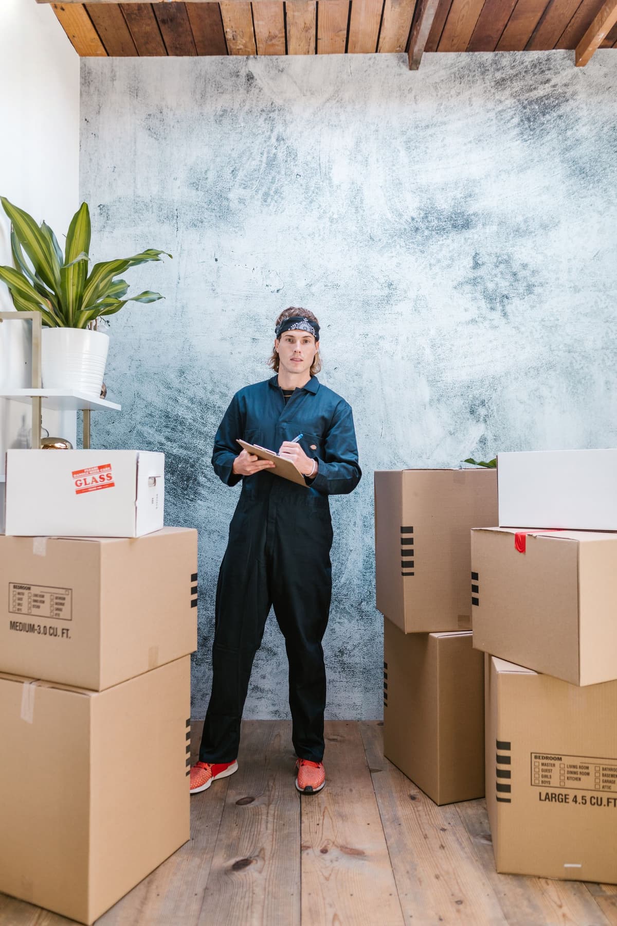 Professional mover performing moving services on a real job
