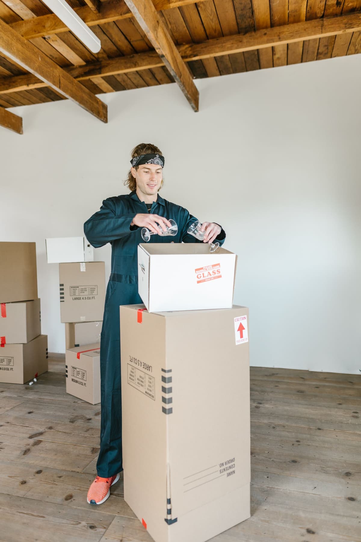 Professional mover performing moving services on a real job