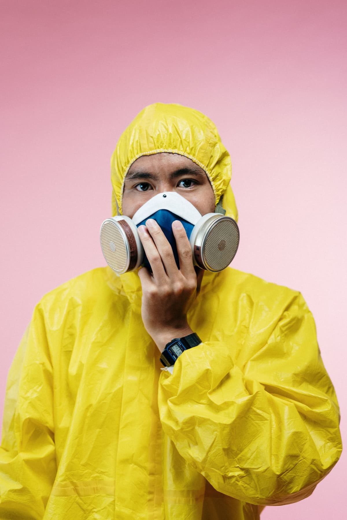 Professional pest control tech performing pest control service on a real job