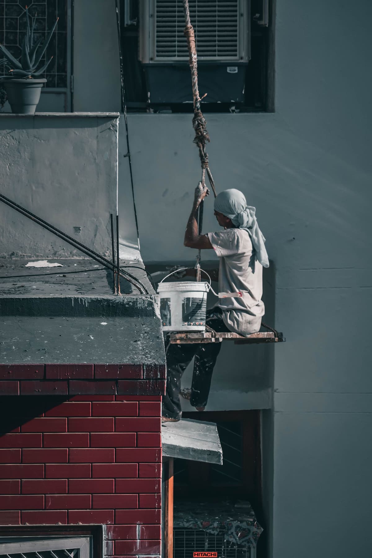Professional roofer performing roofing work on a real job