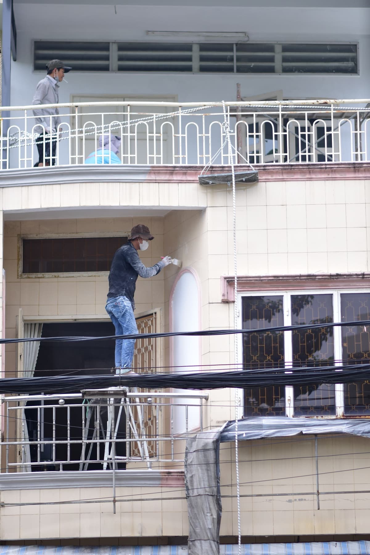 Professional roofer performing roofing work on a real job